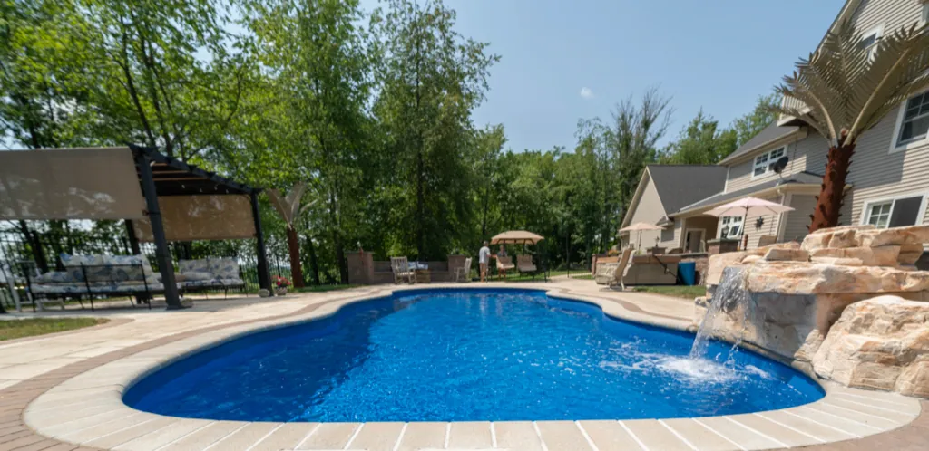 Inground fiberglass pool installed by Leisure Pools Westchester in Yonkers , NY