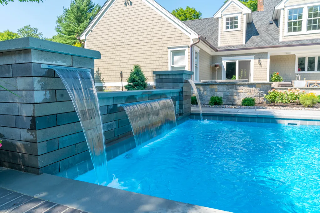 Inground fiberglass pool installed by Leisure Pools Westchester in Pleasantville , NY