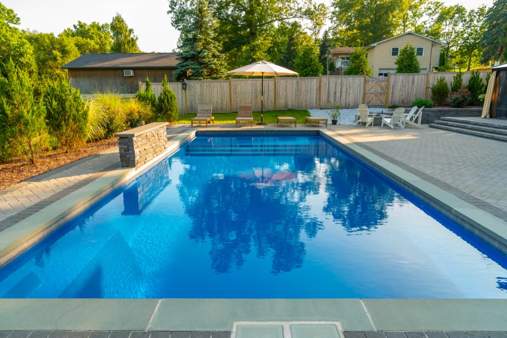 Inground fiberglass pool installed by Leisure Pools Westchester in Ossining , NY