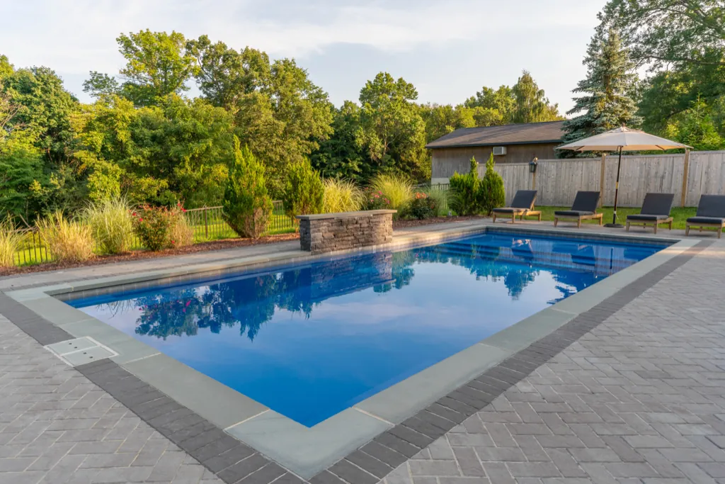Inground fiberglass pool installed by Leisure Pools Westchester in Mount Kisco , NY