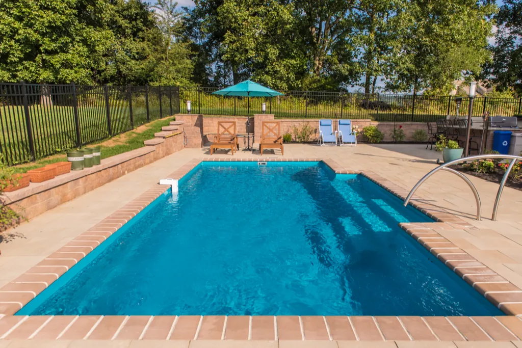 Inground fiberglass pool installed by Leisure Pools Westchester in Bedford Hills, NY