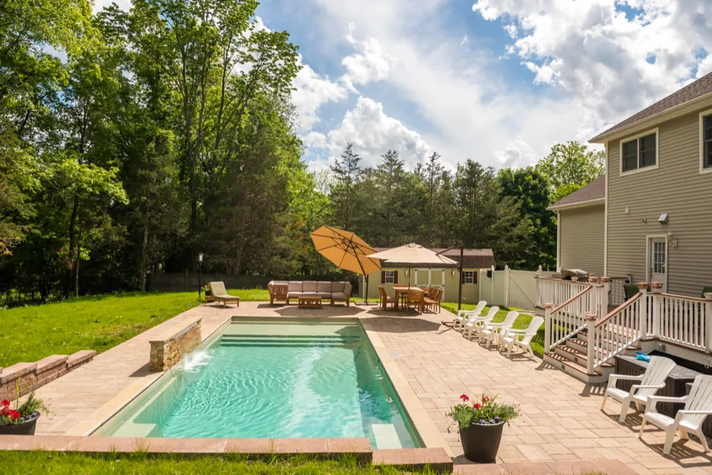 Fiberglass-Pools-Leisure-Pools-Westchester-027 Inground fiberglass pool installed by Leisure Pools Westchester in Armonk, NY